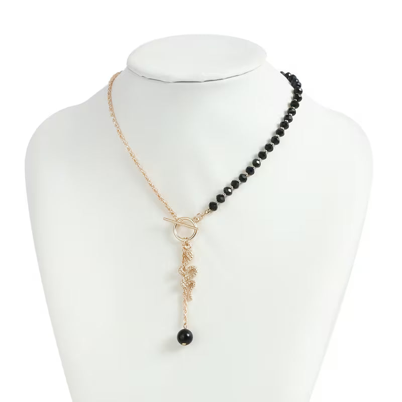 Halskette mit Schlangenanhänger im Retro-Stil