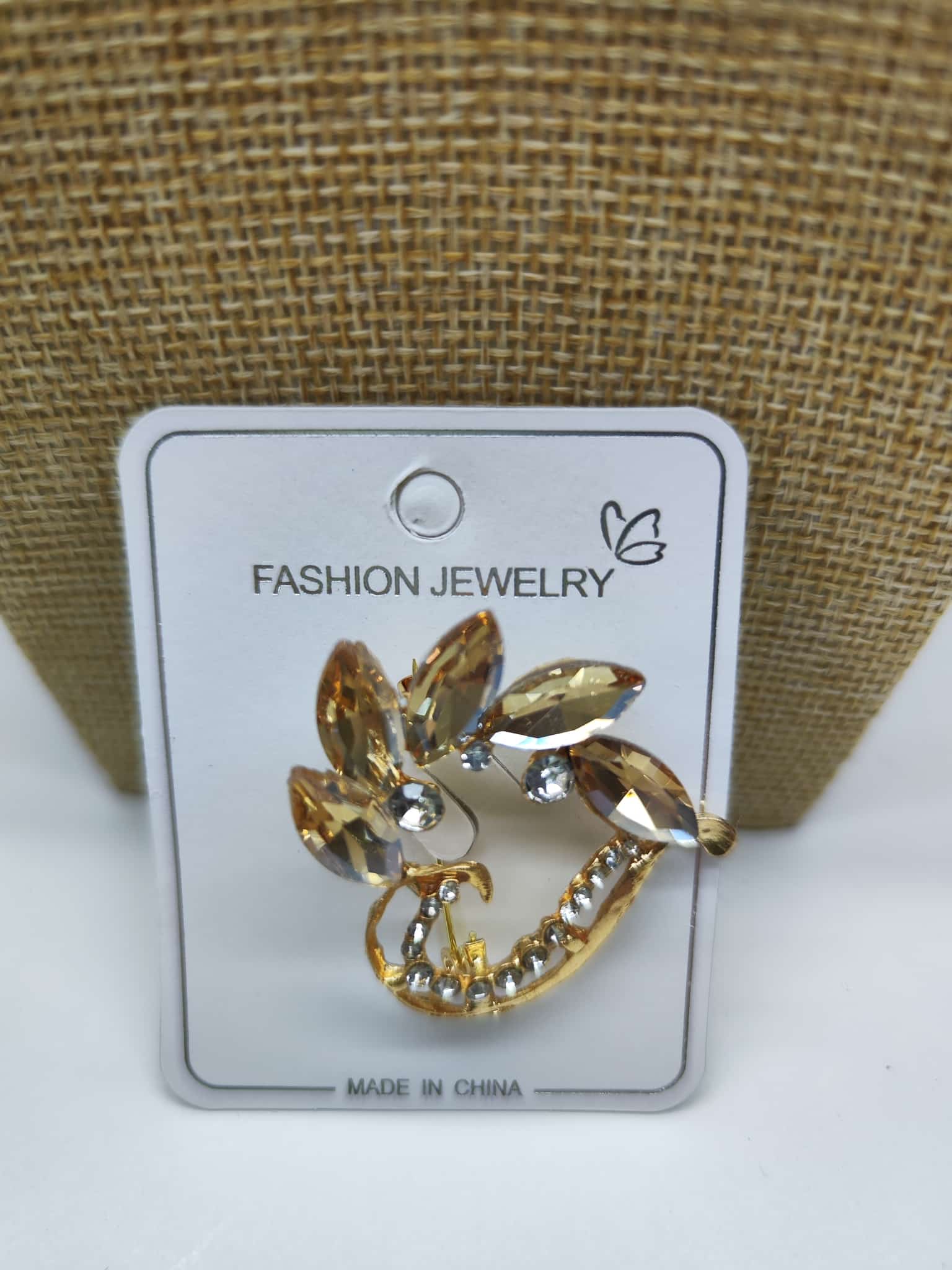 Broche - Dorado con brillo marron