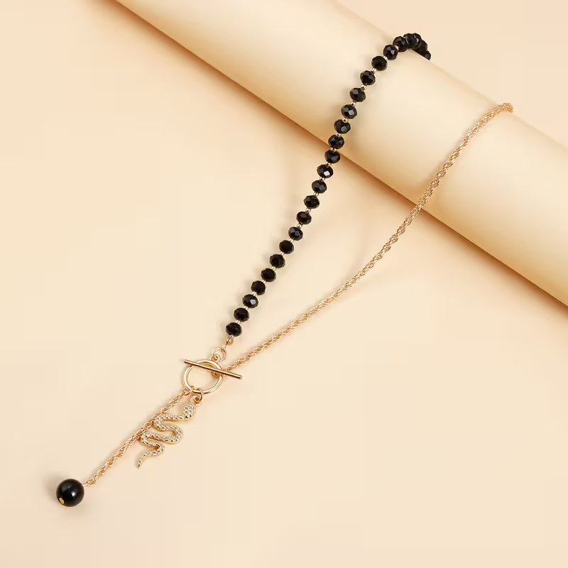 Halskette mit Schlangenanhänger im Retro-Stil